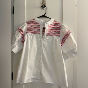 Tuckernuck white with red and blue embroidery shirt. Size small.